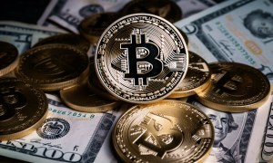 Ambcrypto Bitcoin Logo Surrounded By Notes Of Cash B821643a 139e 4977 B735 C923253ce326 1000x600.png