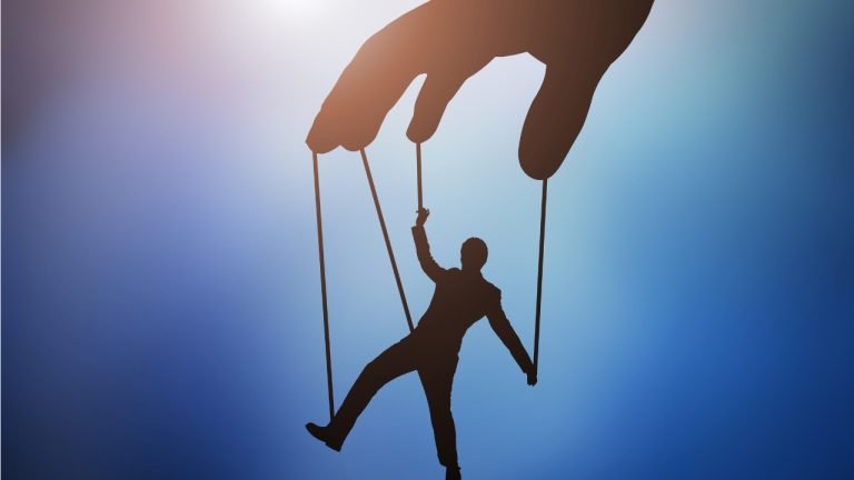 Businessman Saving Piggybank From Hammering Picture Id921353742.jpg