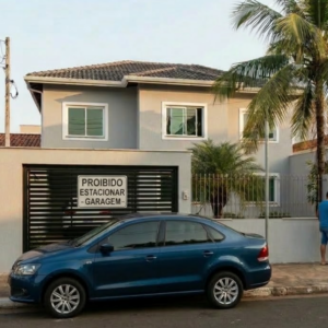 Posso estacionar em frente à minha própria garagem?