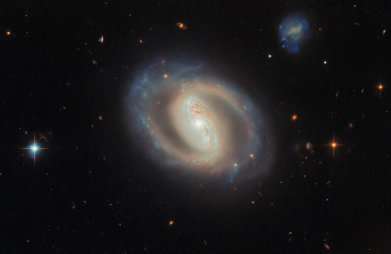 Hubble espia uma espiral ativa