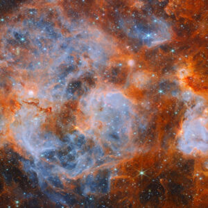 Estrelas se formando em um caldeirão nebuloso