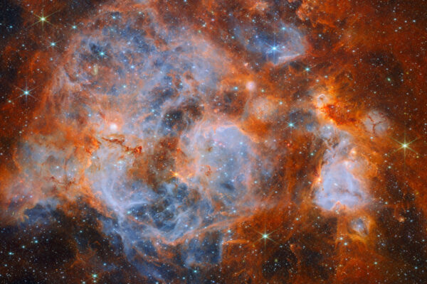 Estrelas se formando em um caldeirão nebuloso